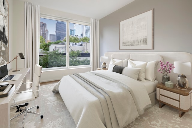 bedroom featuring a view of skyline and an office area