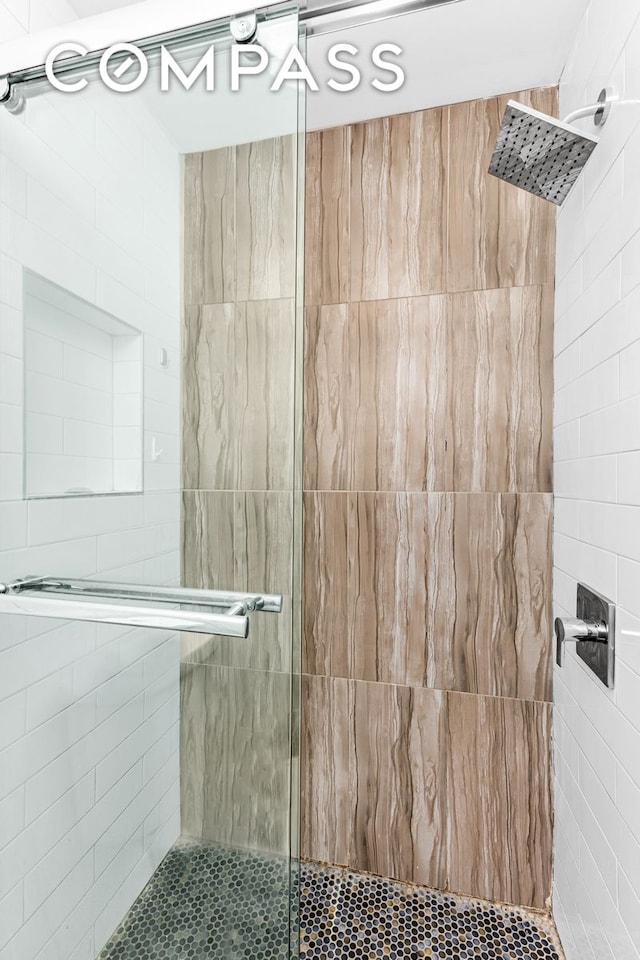 full bath featuring a stall shower