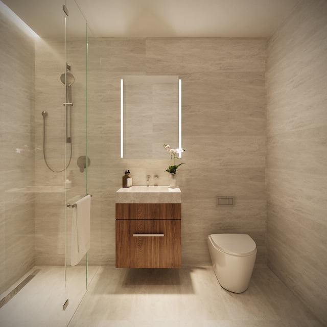 219 Hudson St Unit 5-A, New York City, NY 10013 - bathroom with tile walls, vanity, and a tile shower