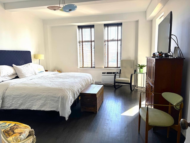 bedroom with dark wood-type flooring