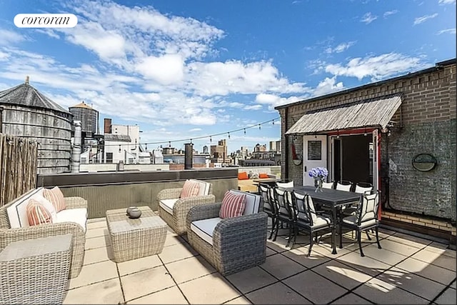 40 W 72nd St Unit 17B, New York City, NY 10023 - view of patio featuring outdoor lounge area, a view of city, and outdoor dining space