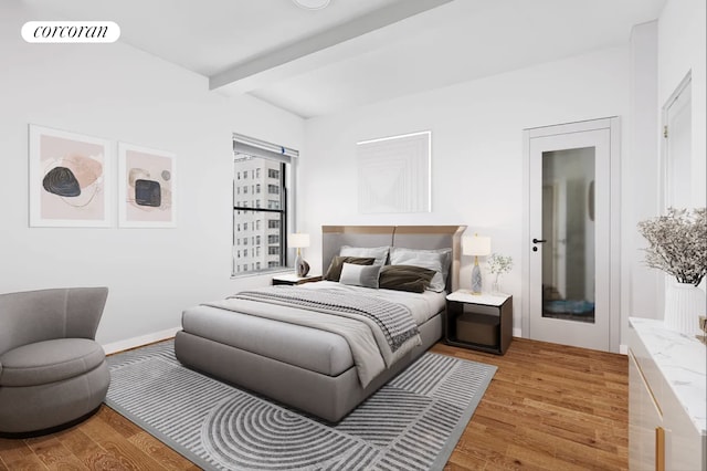 40 W 72nd St Unit 17B, New York City, NY 10023 - bedroom featuring light wood-type flooring, beam ceiling, and baseboards