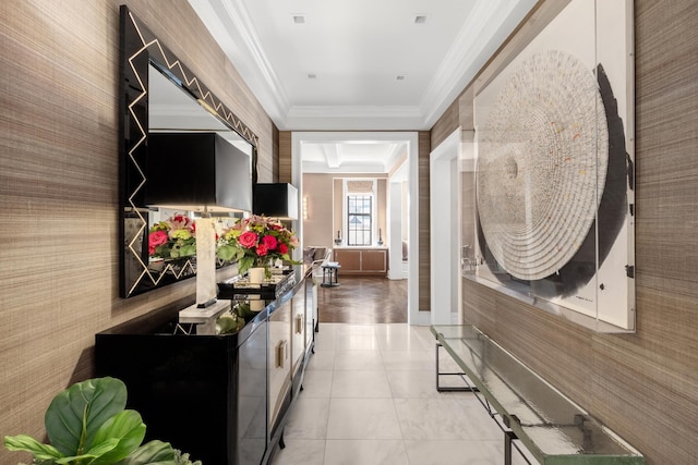 corridor with wallpapered walls and crown molding