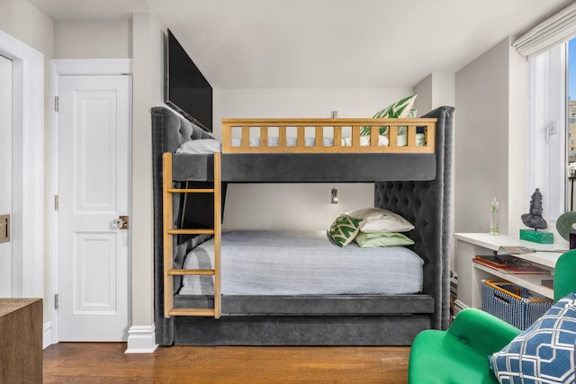 bedroom featuring wood finished floors