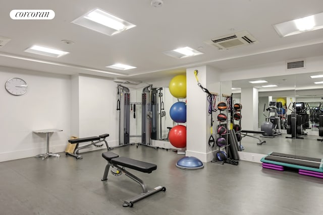 exercise room with baseboards