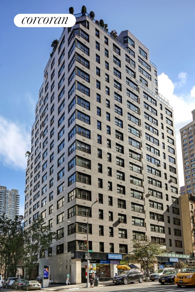 view of building exterior featuring a city view