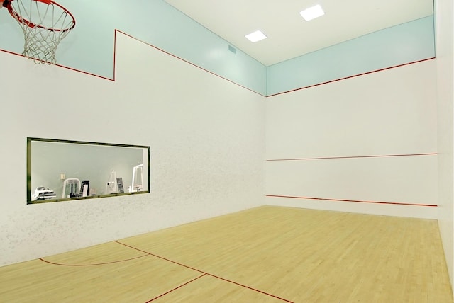 surrounding community featuring a sport court