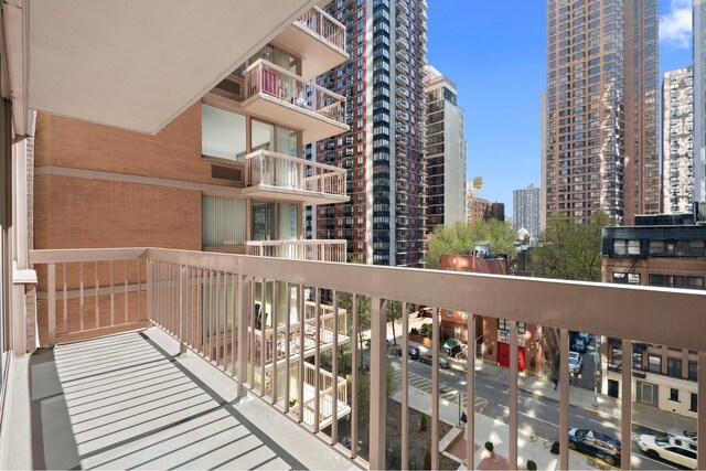 235 E 40th St Unit 6B, New York City, NY 10016 - balcony featuring a view of city