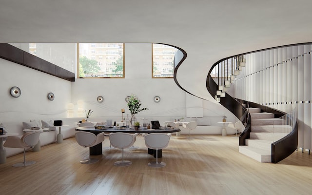 interior space with wood finished floors and stairway