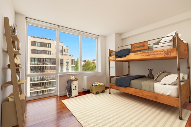 bedroom featuring hardwood / wood-style floors