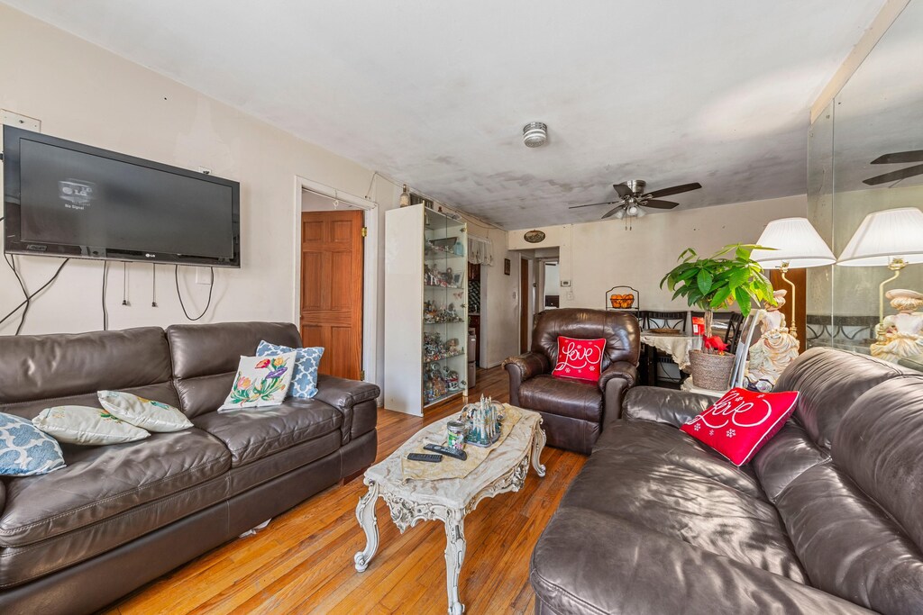 112-01 38th Ave, New York City, NY 11368 - living room with a ceiling fan and hardwood / wood-style floors