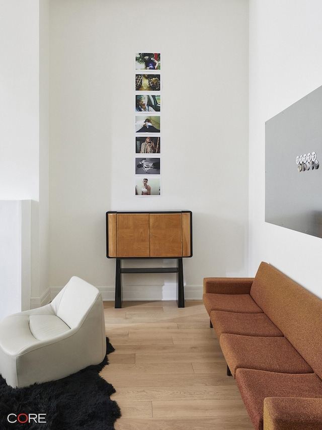 87 Leonard St Unit Mais1B, New York City, NY 10013 - sitting room featuring baseboards and light wood-type flooring