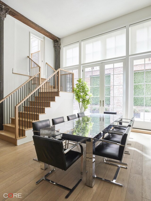 87 Leonard St Unit Mais1B, New York City, NY 10013 - dining area with french doors, stairway, and hardwood / wood-style flooring