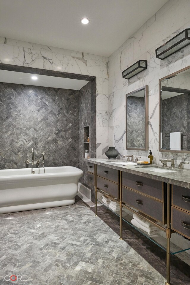 87 Leonard St Unit Mais1B, New York City, NY 10013 - full bath with a freestanding bath, recessed lighting, and double vanity