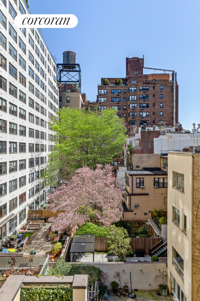 400 E 51st St Unit 4E, New York City, NY 10022 - view of apartment building / complex featuring a city view