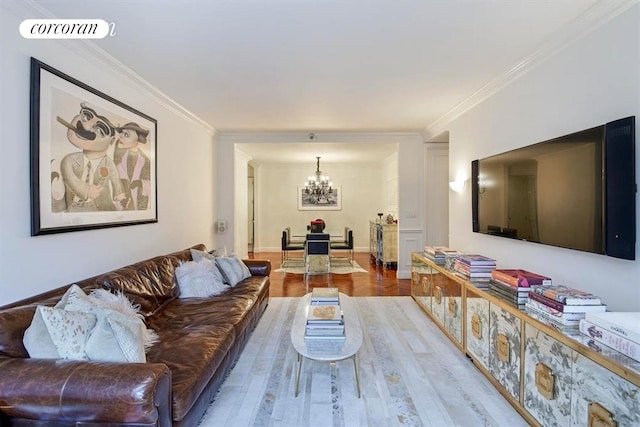400 E 51st St Unit 4E, New York City, NY 10022 - living room with wood finished floors, a chandelier, and ornamental molding
