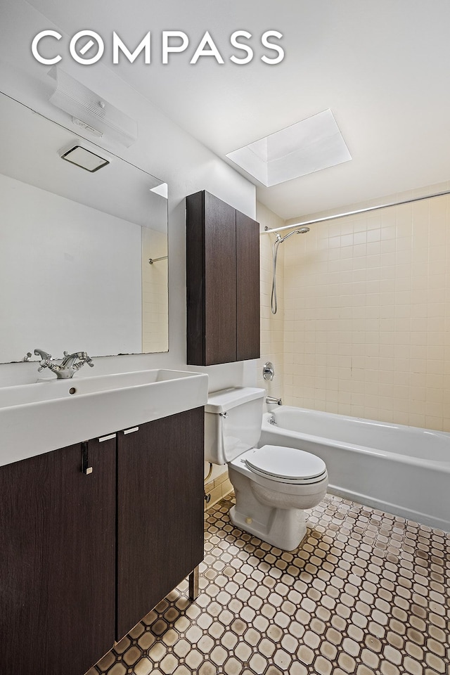 bathroom with toilet, bathtub / shower combination, and vanity