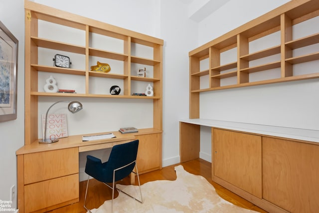49 E 21st St Unit 2B, New York City, NY 10010 - office space with built in study area, light wood-type flooring, and baseboards