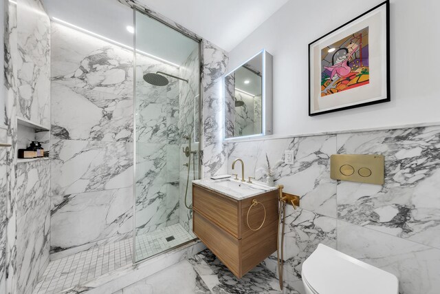 114 Lexington Ave Unit 203, New York City, NY 11238 - full bath featuring tile walls, a marble finish shower, vanity, toilet, and marble finish flooring