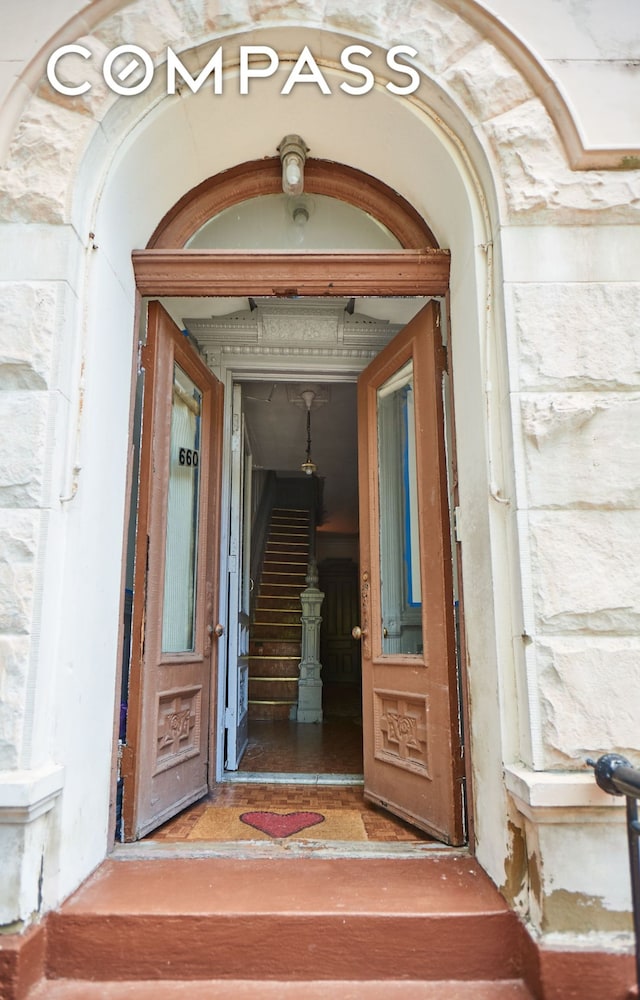 660 Macon St, New York City, NY 11233 - view of exterior entry with stone siding