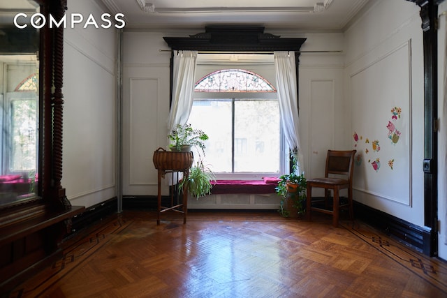 660 Macon St, New York City, NY 11233 - sitting room featuring a decorative wall and crown molding