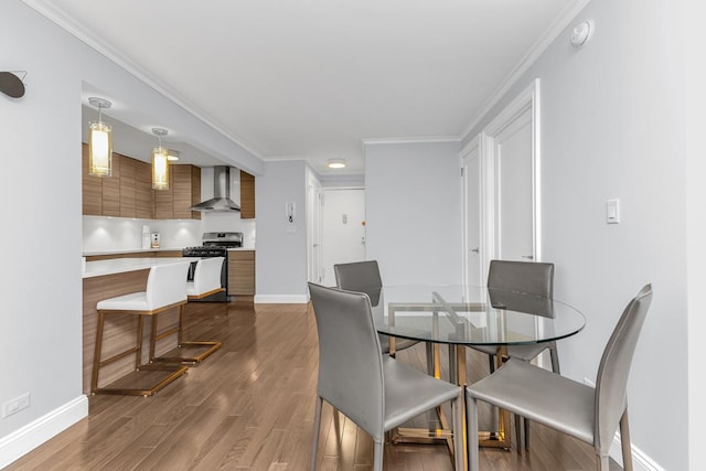 333 E 34th St Unit 2M, New York City, NY 10016 - dining area featuring dark wood-style flooring and ornamental molding