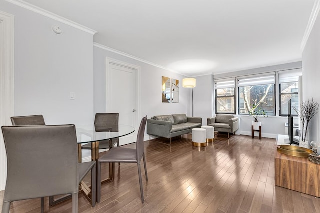 333 E 34th St Unit 2M, New York City, NY 10016 - dining room with wood finished floors, crown molding, and baseboards