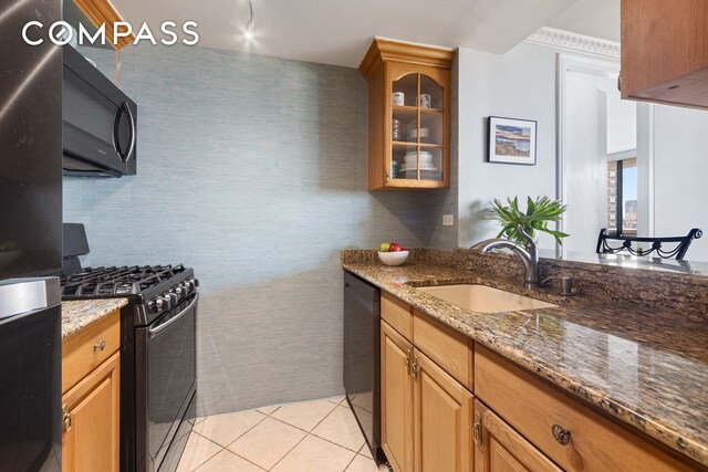 233 E 86th St Phb, Phb, New York City, NY 10028 - kitchen featuring black microwave, range with gas cooktop, dishwasher, a sink, and freestanding refrigerator