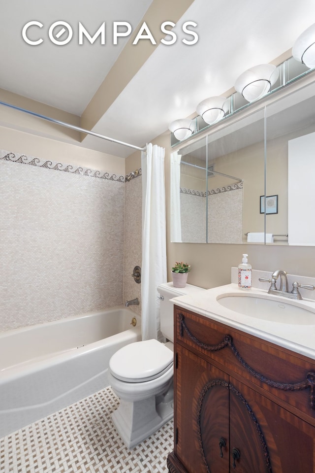 full bath featuring vanity, tile patterned floors, toilet, and shower / tub combo with curtain