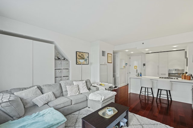 5-19 Borden Ave Unit 1-C, New York City, NY 11101 - living area with dark wood-type flooring and recessed lighting