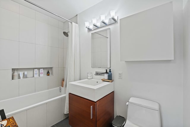 5-19 Borden Ave Unit 1-C, New York City, NY 11101 - full bathroom with tiled shower / bath combo, toilet, and vanity
