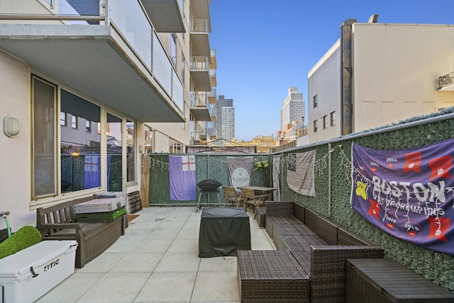 5-19 Borden Ave Unit 1-C, New York City, NY 11101 - view of patio / terrace featuring a city view and outdoor lounge area