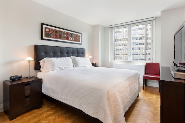 bedroom featuring baseboards