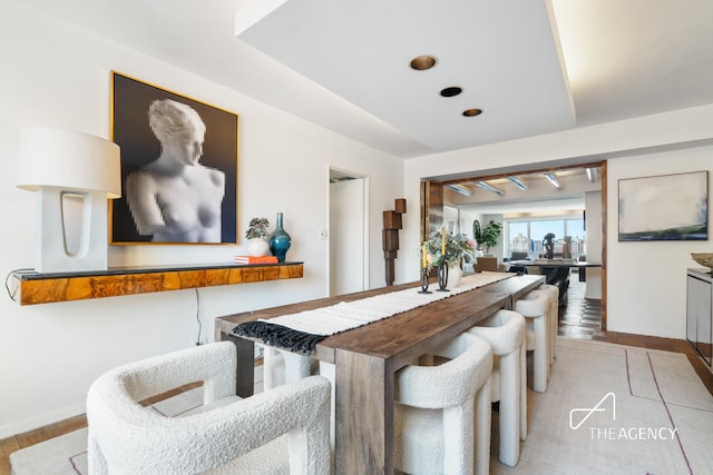 1050 5th Ave Unit 17D, New York City, NY 10028 - dining room featuring wood finished floors and baseboards