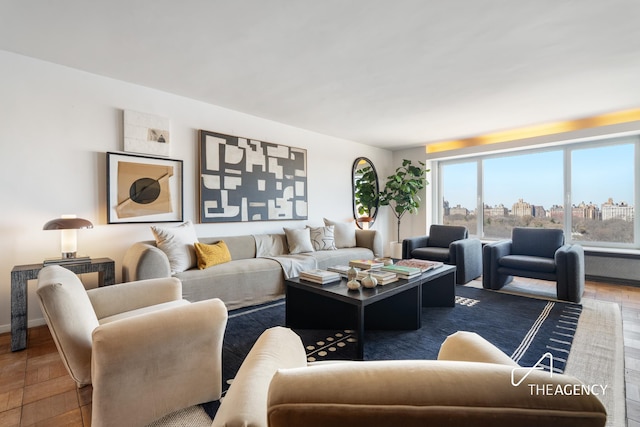 1050 5th Ave Unit 17D, New York City, NY 10028 - living area featuring wood finished floors