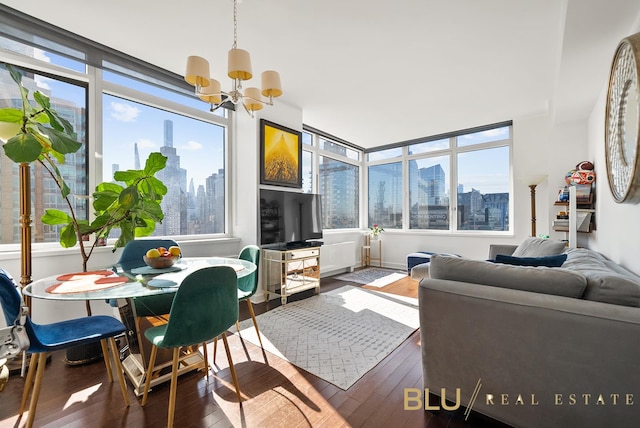 100 Riverside Blvd Unit 28-E, New York City, NY 10069 - living room featuring a chandelier and hardwood / wood-style flooring