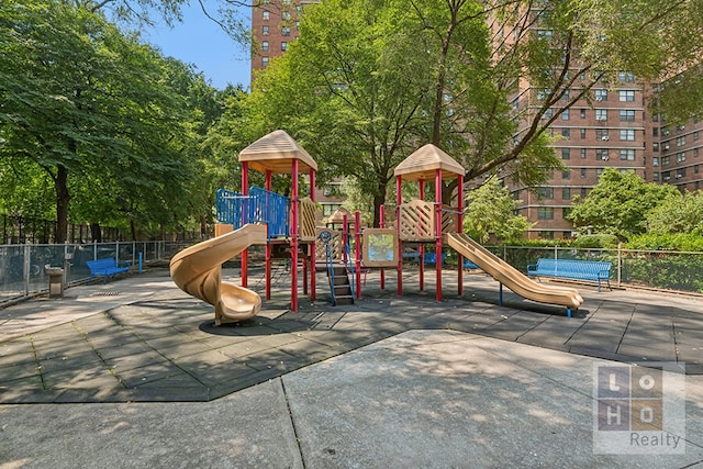 community jungle gym with fence