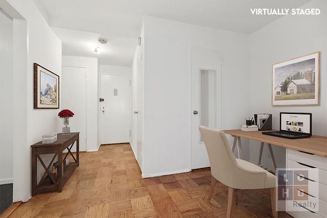 interior space featuring baseboards