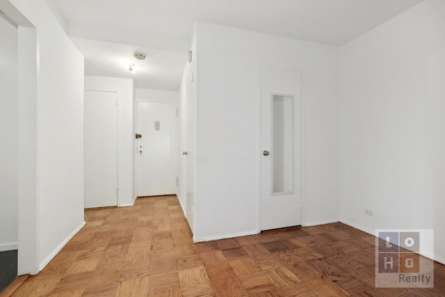 empty room with baseboards