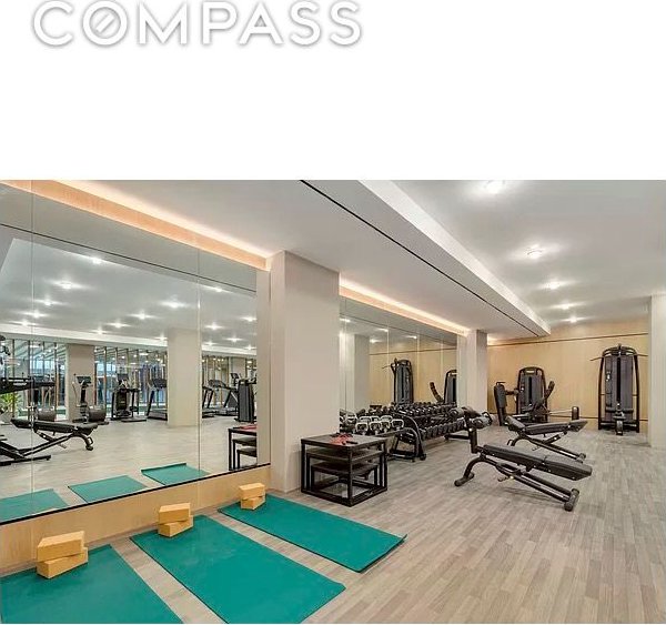 exercise room with wood finished floors