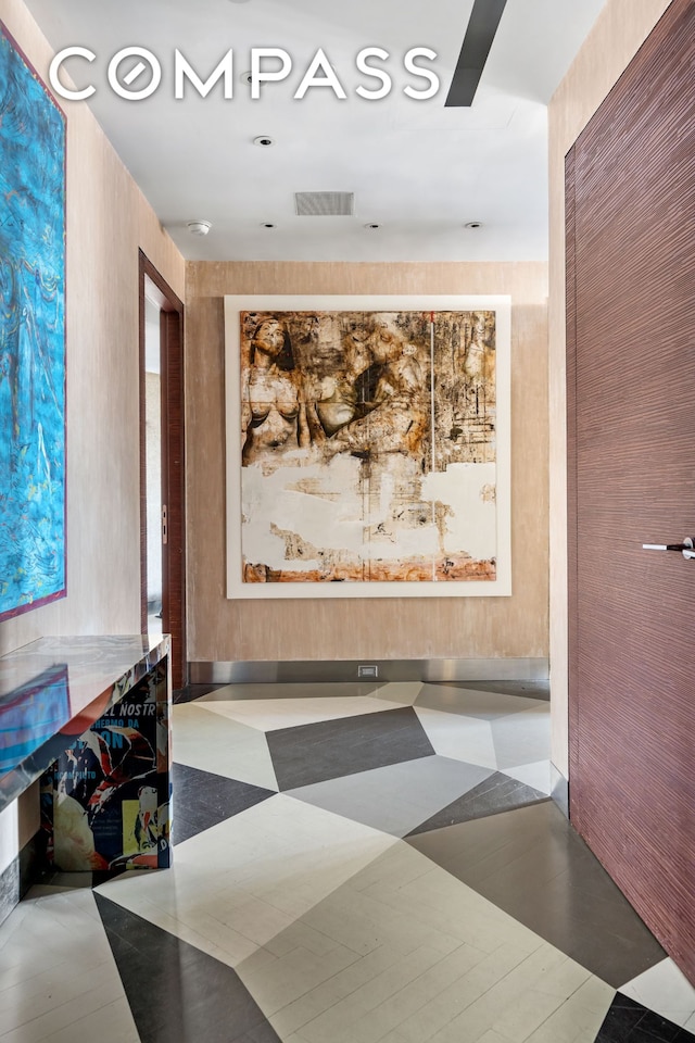 building lobby featuring visible vents