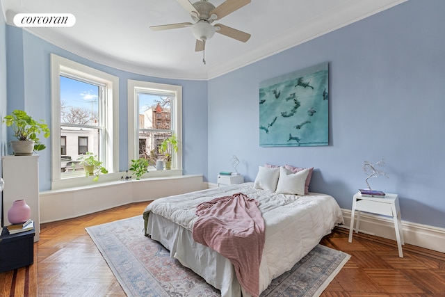 bedroom featuring ceiling fan, baseboards, visible vents, and ornamental molding