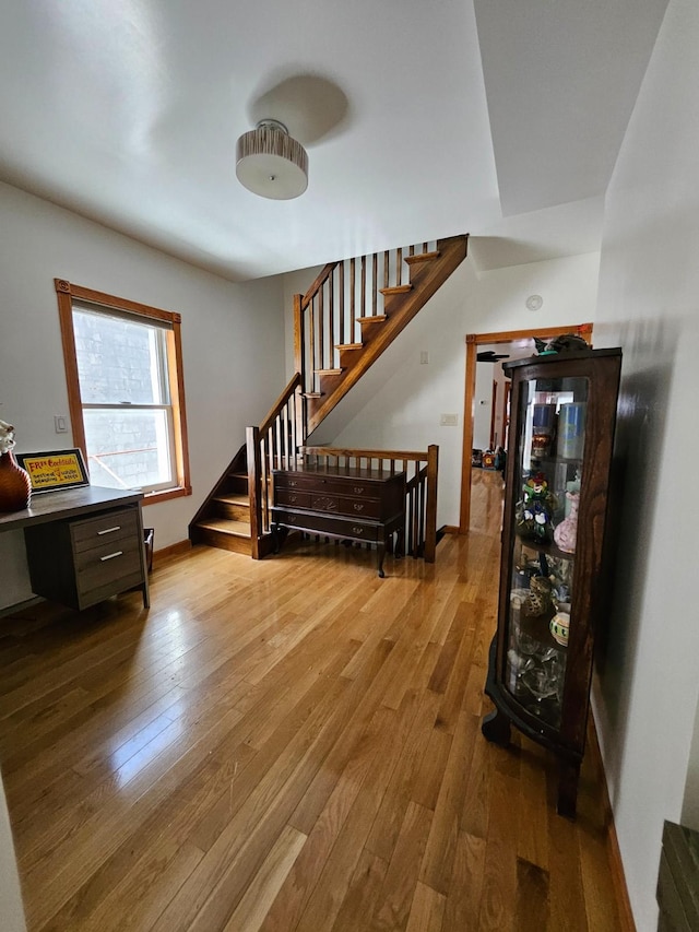 230 26th St, New York City, NY 11232 - foyer with hardwood / wood-style floors, stairway, and baseboards