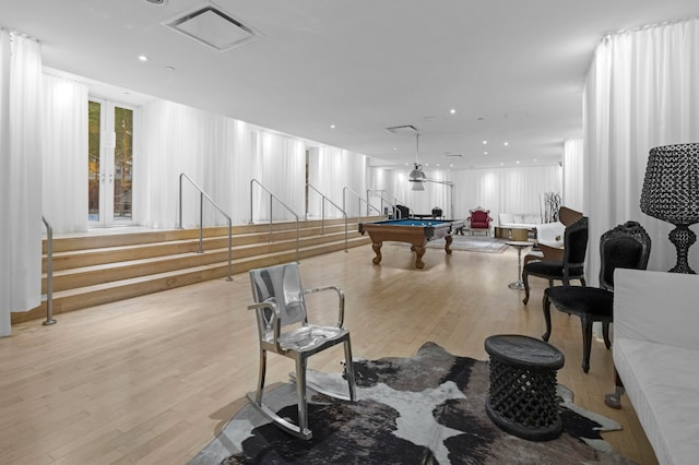 game room featuring billiards and wood finished floors