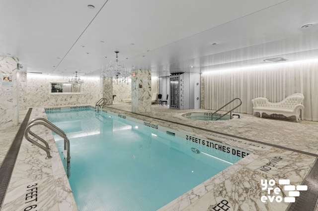 15 Broad St Unit 2714, New York City, NY 10005 - indoor pool featuring a chandelier