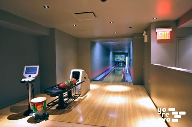 15 Broad St Unit 2714, New York City, NY 10005 - playroom featuring bowling, wood finished floors, and recessed lighting