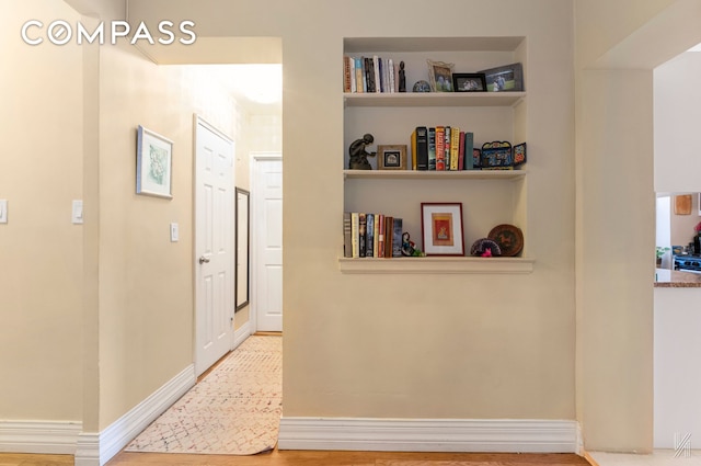 34-41 85th St Unit 4P, New York City, NY 11372 - corridor featuring wood finished floors and built in shelves