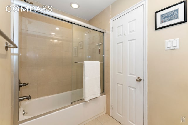 34-41 85th St Unit 4P, New York City, NY 11372 - bathroom featuring enclosed tub / shower combo and tile patterned floors