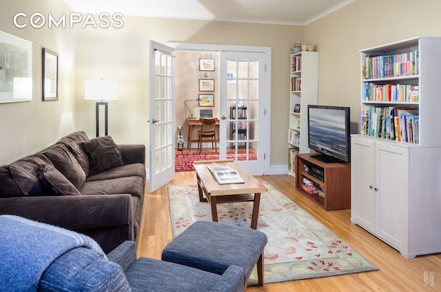 34-41 85th St Unit 4P, New York City, NY 11372 - living area featuring french doors and light wood-style flooring