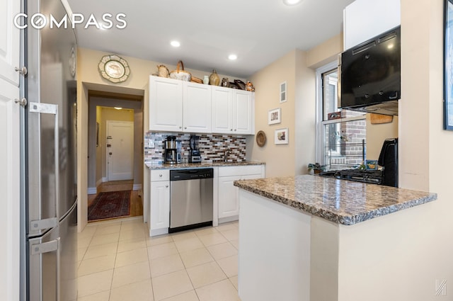 34-41 85th St Unit 4P, New York City, NY 11372 - kitchen with dishwasher, white cabinets, stone countertops, backsplash, and recessed lighting